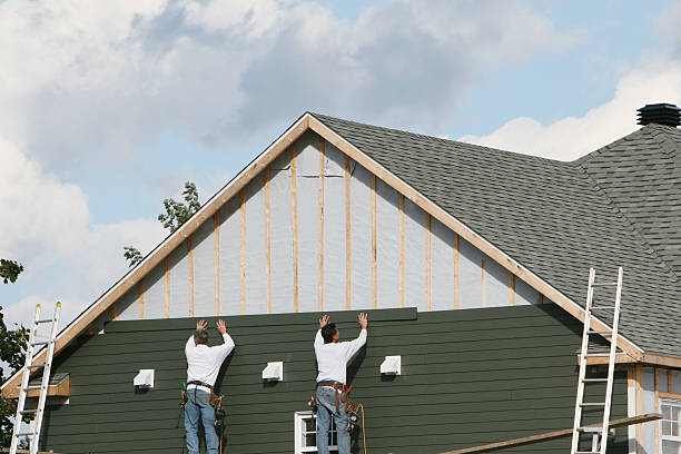 Professional Vinyl Siding technician working in Staley, NC